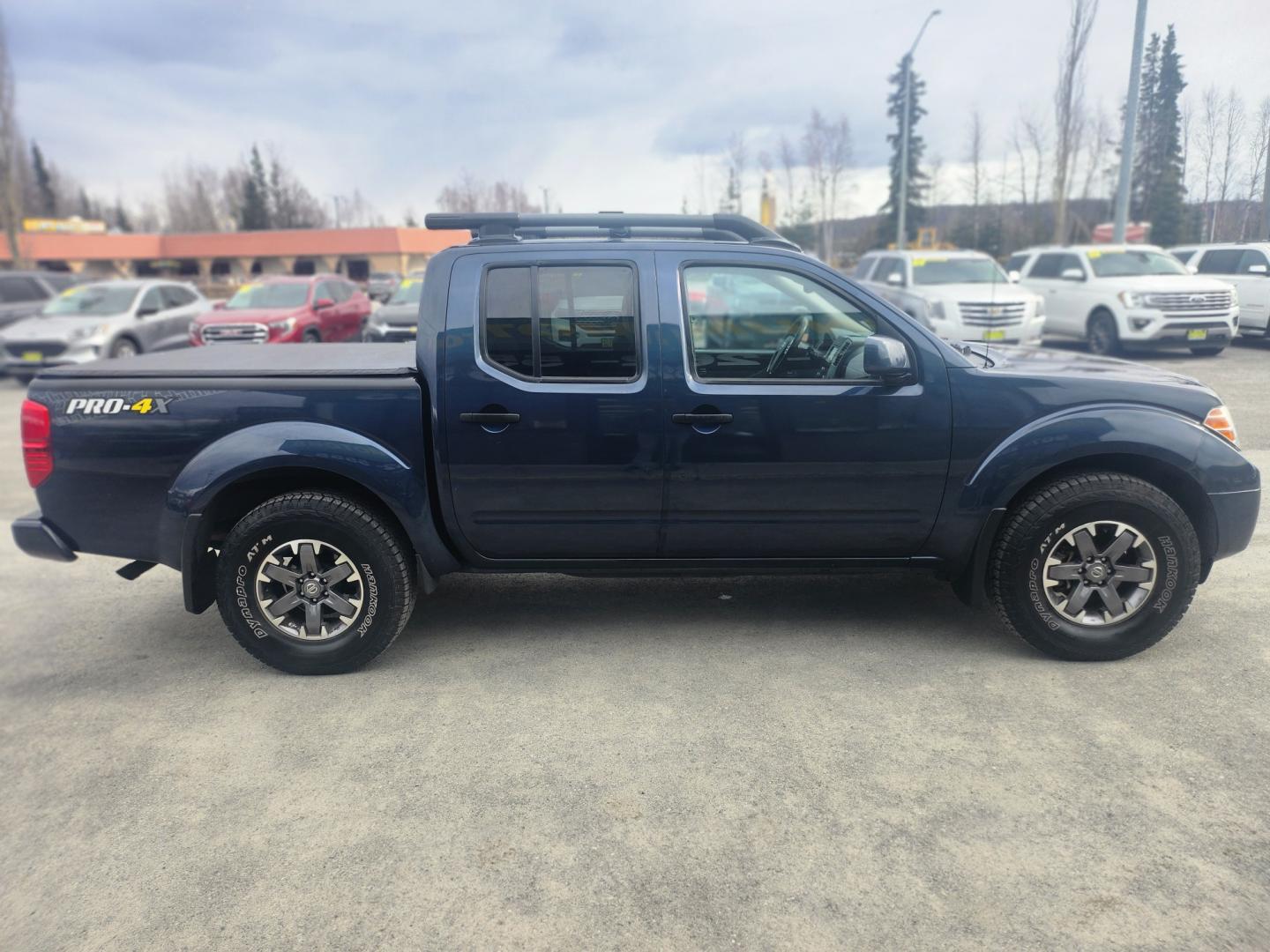 2020 BLUE NISSAN FRONTIER pro-4x (1N6ED0EB6LN) with an 3.8L engine, Automatic transmission, located at 1960 Industrial Drive, Wasilla, 99654, (907) 274-2277, 61.573475, -149.400146 - Photo#6